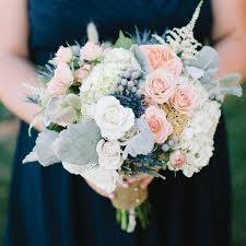 Choosing a blush pink garden wedding can take many forms, which does not mean the traditional white dress need be ignored. Wedding Flowers Blush Pink Navy Wedding Flowers