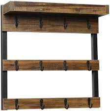 Coffee mug holder wall mounted, coffee cup wall rack rustic vintage coffee cup holders for counter, coffee mug shelf 12 coffee mug hanger for home, kitchen display this mug holder is made of steel and sits on a standard wooden platform that you can then mount on a wall or table. Buy Oropy Coffee Mug Rack Wall Mounted Rustic Wood Cups Rack With 12 Hooks And Storage Shelf For Home Kitchen Display And Collection Rustic Brown Online In Italy B08bhm8hjr