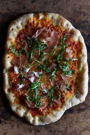Arugula And Prosciutto Pizza Beyond Pepperoni Pizza Toppings Recipe Prosciutto Pizza Prosciutto Pizza Toppings