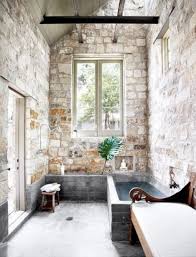 Brick walls fit in with a variety of styles, and with the right sealant or finish, they can be used with ease in the bathroom as well. 48 Stylish Bathrooms With Brick Walls And Ceilings Digsdigs