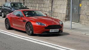 Image result for Fire Red 2012 Aston Martin