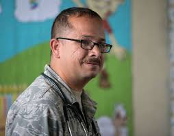 U.S. Air Force Tech. Sgt. Victor Garcia (left), 460th