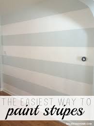 Bring in touches of crystal or french metallic gold accents to play off pastel walls and add glamour, as in this gorgeous dining room. How To Paint Stripes Our Dining Room Wall Update Balancing Home