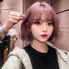 The hair is cut with almost no layers at all, keeping it very natural looking. Korean Style Short Hair
