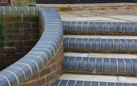 .behind the bullnose edge, put the line on top of brick set back just behind bullnose put wrip up bit cement bag on top then brick, then pull line tight and put im assuming your using them as copings.mark a line with a pencil quarter of the brick in from each side then set two lines from one end to the. Blue Double Bullnose Brick Bn 2 2 From Stock