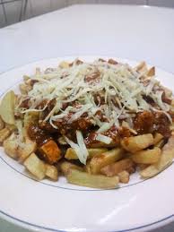 It was widely popularized across canada and beyond in the 1990s. Poutine Canadian National Dish Picture Of Diners Restaurant Mwanza Tripadvisor