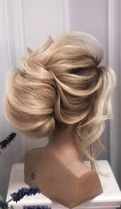 Wearing your hair curly is not a singular style. Trendiest Updos For Medium Length Hair To Inspire New Looks