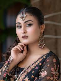 Grace, captured. Aqsa Khan looking absolutely captivating in this  embroidered ensemble. Swipe through the details! From the full look to the  tight close-up, we made sure the focus