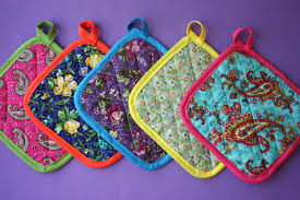 You can use it either way shiny side or dull side out if you want. Homemade Pot Holders Jenny Can Cook