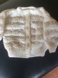 Knitting is a method by which yarn is manipulated to create a textile or fabric.it is used in many types of garments.knitting may be done by hand or by machine. Hand Knitted Baby Girls Cardigan 3 6 Months Ebay Crochet Baby Blanket Free Pattern Baby Knitting Patterns Baby Knitting