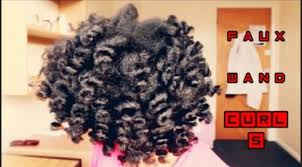 Keep brushing until you get the smooth look you want, but keep in mind that it can take as much as 5 minutes of brushing to calm down the curls, so be patient. Big Fluffy Faux Wand Curls On Natural Hair
