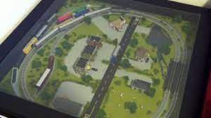 The hack includes the liatorp coffee table with glass top and pull out drawer that was modified to include an n scale model train set. The Train Set Coffee Table Scene360