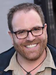 How about Josh Gates making an appearance as a archaeologist?