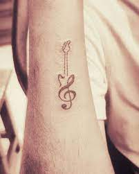 101 Awesome Guitar Tattoo Ideas You Need To See Guitar Tattoo Design Mom Tattoo Designs Guitar Tattoo