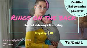 Pull the fabric (called the tail) around you, making sure it isn't twisted behind your back. Ringsling With Rings On The Back Youtube