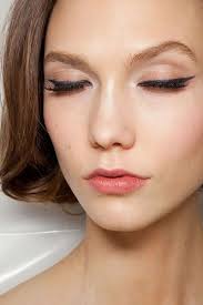 Karlie Kloss- arched #brows, winged liner, cupid's bow