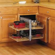 Once the face frames of the adjoining cabinets are in position, the sides of the lazy susan will not be visible. Small Kitchen Space Saving Tips Corner Kitchen Cabinet Kitchen Corner Cupboard Kitchen Cabinet Storage