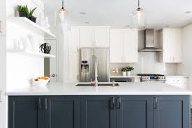 For years, i yearned for more bright white kitchens to fill out my portfolio, but almost all of my projects were some shade of cream. Trending Grey Kitchen Cabinets With Navy Blue Island Top Kitchen Cabinets Design