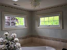 Marvin Infinity Awning Window Installed In Bathroom Of Home In Nj Patio Door Installation Window Installation Custom Awnings