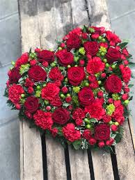 Red & white funeral flowers florist delivered red and white funeral flowers symbolize a multitude of feelings. Red Rose And Carnation Heart Funeral Flowers Vanilla Blue Flowers