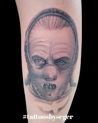 Hannibal Lecter tattoo by Sean Seger Now booking May. Message the page to  book you next tattoo with Sean! #hanniballectertattoo #tattoosbyseger  #crystalcitymo #festusmo #blackandgreytattooartists #blastedtattoocare  #merakitattoo520 #tattooedpeople