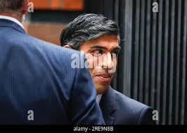 Prime Minister Rishi Sunak has his blood pressure checked by pharmacist Peter  Baillie during a visit to a GP surgery and pharmacy in Weston, Southampton,  Hampshire. Picture date: Tuesday May 9, 2023