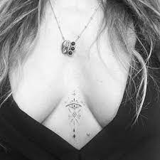 When it comes to small chest tattoos like the ones featured here, they can be completed in a single session, which means a lower starting price right off the bat. Sternum Tattoo Ideas That Will Make You Want A Tattoo Between Your Breasts