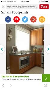 Greige Walls In Kitchen With Oak Cabinets And Grey Counters Greige Walls Classic Bathroom Design Classic Bathroom