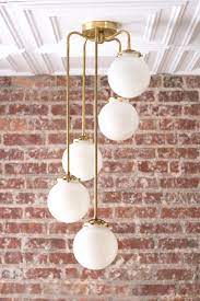 This chandelier is incredibly stylish and architecturally inspired. Chandelier Model No 1809 Peared Creation