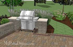 Wood pergola over grill and rock patio. Pin On Patio Ideas