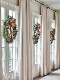 Tante S Fr Loves This Wreaths Adorned With Sugared Fruit Decorate French Doors That Open To The Classic Holiday Decor Christmas Home Holiday Home Decor