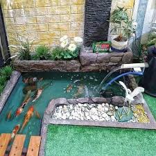 Seger Kalau Ada Ikan Depan Rumah Gini Dekorumahyuk Desaininterior Interior Dekorasirumah Desaindapur Rumahimpian Kolam Ikan Kolam Air Mancur