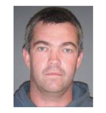 Hitch hiker arrested after police car rammed