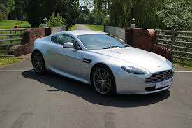 Image result for Titanium Silver 2010 Aston Martin