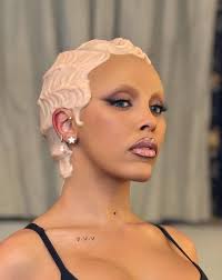 Korg funk5 @aphextwin.afx by Miss @nadialeecohen and @charliedenis stills  of the video featuring my contributions… a faceless mask, a clown named  Jackie, a tongue I made 7 years ago and a Nadia