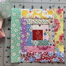 As always, leave any questions or comments for us below. Log Cabin Quilt