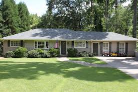 Fresh paint, new additions, and architectural changes turned the lackluster facades into true showstoppers. We Added A Master Suite A Couple Of Years Ago The Lower Level Basement Terrace Level Is 1900 Sq Ranch House Exterior Brick Ranch Houses House Paint Exterior