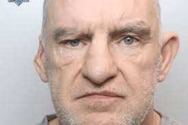 Man who killed his partner in her Wigan home is jailed for life