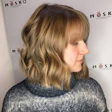 Just a teeny bit boyish, going for a wavy bob with bangs is a fantastic way to bring attention to your feminine confidence. Wavy Blunt Cut Bob With Bangs Bpatello
