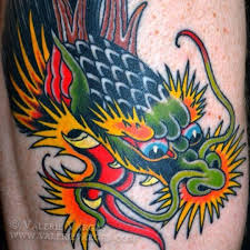 10 Old School Dragon Head Tattoos That Truly Look Classy Dragon Head Tattoo Dragon Tattoo Designs Head Tattoos