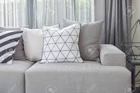 In stock on may 20, 2021. Light Gray Sofa With Varies Pattern Pillows In Modern Living Stock Photo Picture And Royalty Free Image Image 70419635