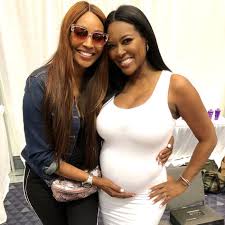 Photos Rhoa Star Cynthia Bailey Cradles Kenya Moore S Growing Baby Bump Plus Kenya Shares New Pic With Husband Kenya Moore Cynthia Bailey Black Goddess