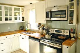 Butcher block counters have one quality that elevates them over many other counter materials: Image Result For Backsplash Ideas For Butcher Block Countertops Butcher Block Countertops Wood Countertops Kitchen White Kitchen Tiles