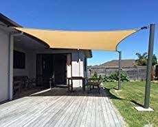 Check spelling or type a new query. Sun Shade Sail Installation Ideas 9 Diy Tips To Make Your Shade Sail Soar Outsidemodern Shade Sails Patio Shade Sail Installation Patio Sun Shades