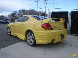 Image result for Sunny Yellow 2004 Tiburon