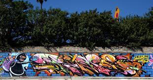 The wild style graffiti is a form of graffiti involving, interlocking letters, arrows, and connecting points. Wildstyle Wikipedia