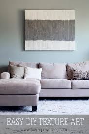 Textured woven wall hanging centered on a wooden dowel and finished with a cord for hanging. Dumpster Texture Art Bower Power Diy Living Room Decor Living Room Diy Home Art