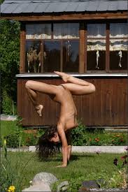 Flexible female does a handstand while completely naked in the.. at New Sex  Pics