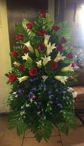 Tribute Spray Red Roses Casablanca Lilies And Blue Orchids Call 940 Tropical Flower Arrangements Funeral Flower Arrangements Creative Flower Arrangements
