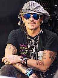 Johnny Depp's tattoos tell the story of his life - find out more